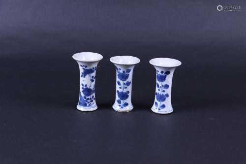 Three porcelain beaker vases with floral decor. China, Kanxi