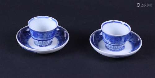 A set of cups and saucers with floral decor. Japan, 19th cen...
