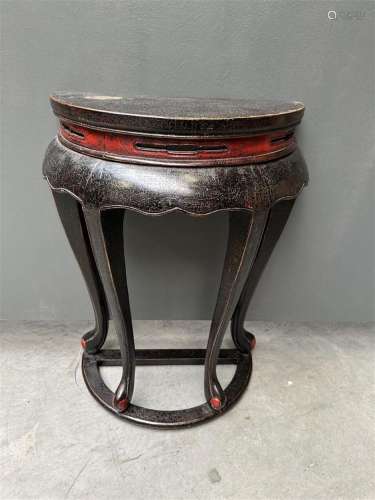 A wooden black and red lacquered console table. China, 20th ...
