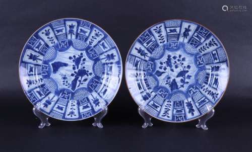 Two porcelain dishes with compartments on the outside.