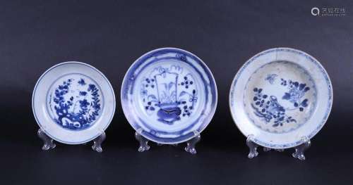 A lot of three porcelain plates including Kangxi. China, 18t...