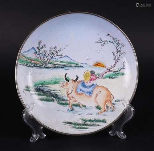 An enamel plate decorated with a water buffalo and a figure ...