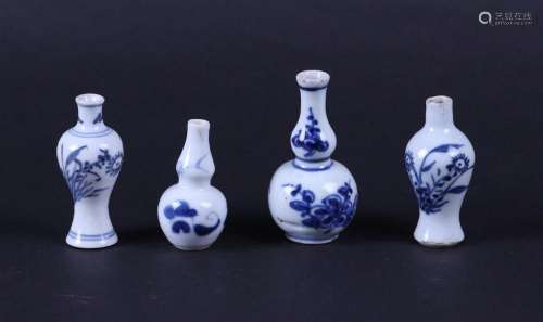 A lot of four porcelain miniature vases. China, Kangxi.