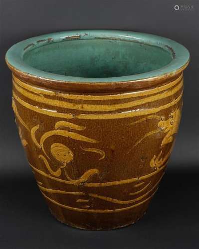 An earthenware cache pot decorated with dragons. China, 1st ...