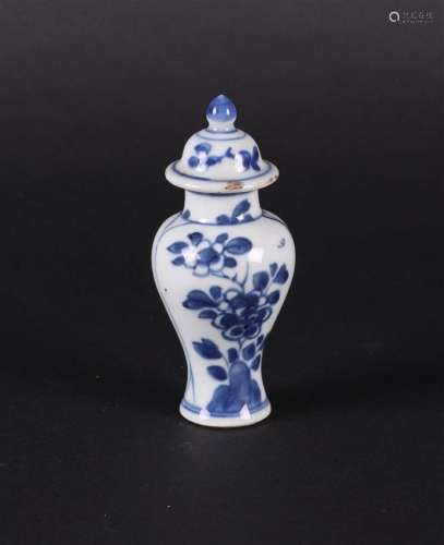 A porcelain baluster-shaped lidded vase with a 2-compartment...