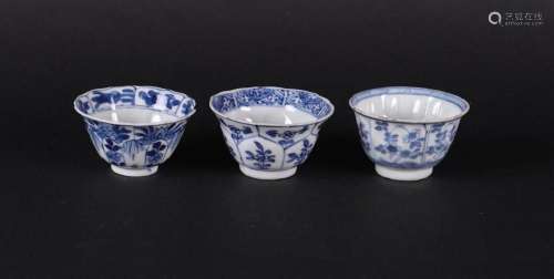 Three various porcelain bowls, all with floral decor in bord...