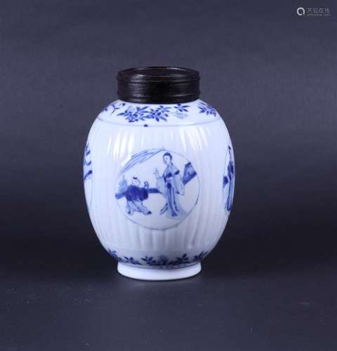 A ribbed porcelain ginger jar decorated with frames and fool...