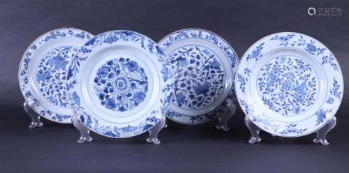 A lot of four porcelain plates with a floral decor. China, 1...
