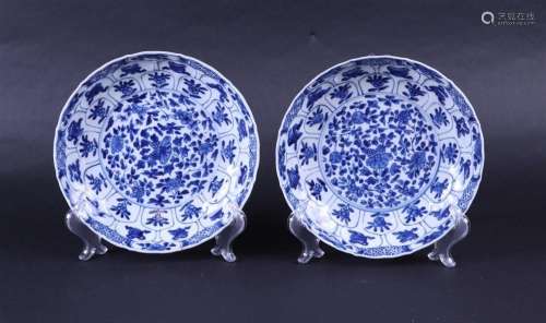A set of two porcelain plates with relief and floral decor, ...