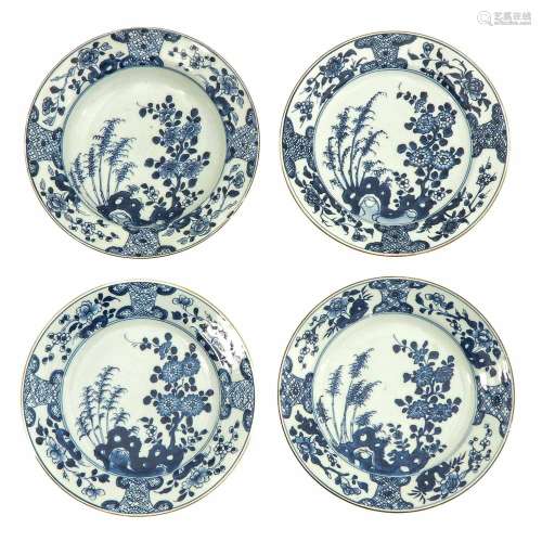 A Collection of 4 Blue and White Plates