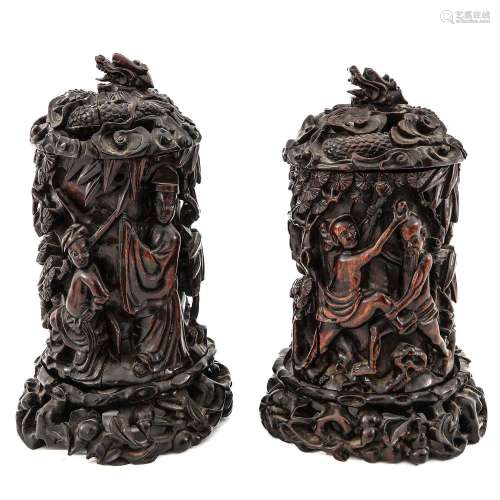 A Pair of Carved Wood Brush Pots with Covers