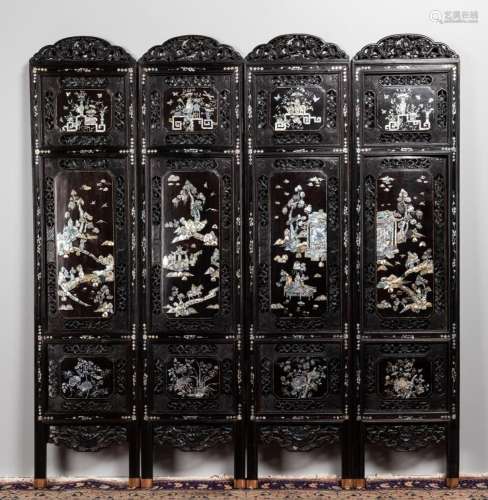 A Chinese ebonized four panel floor screen