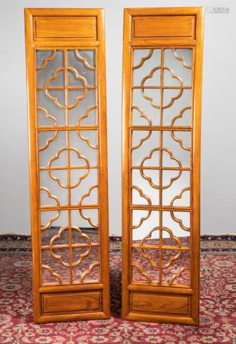 A pair of Chinese hardwood framed mirrored doors. 79 x 19 3/...