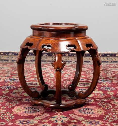 A Chinese hardwood stool of pierced barrel form. 18 in. (45....