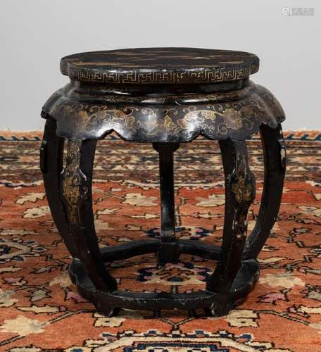 A Japanese black and gilt lacquered wooden stool, 18 in. (45...