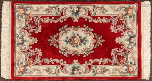 A Chinese wool rug, 3\' x 5\'1\"