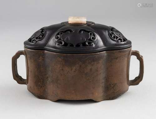 A Chinese bronze incense burner of lobed oval form, 6 1/2 in...