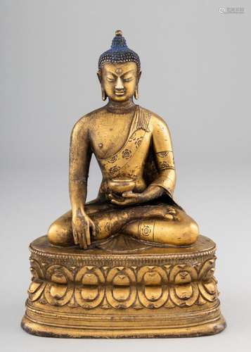 A Sino-Tibetan gilt bronze Buddha. 7 1/2 in. (19.1 cm.) h.