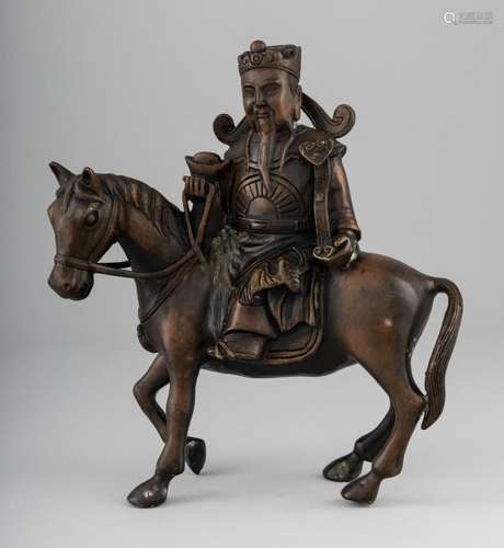 A Chinese bronze figure of a sage on horseback. 10 1/2 in. (...