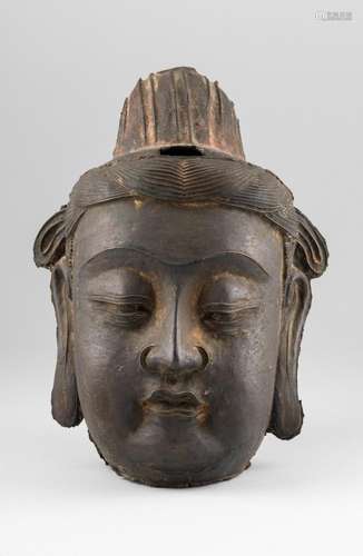 A Chinese cast metal head of Buddha. 11 1/2 in. (29.2 cm.) h...