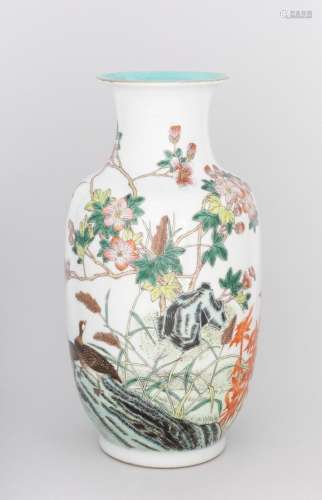 A Chinese white glazed baluster vase, 12 1/2 in. (31.8 cm.) ...