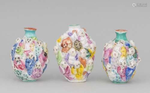 A group of three Chinese snuff bottles, 2 3/4 in. (7 cm.) h.