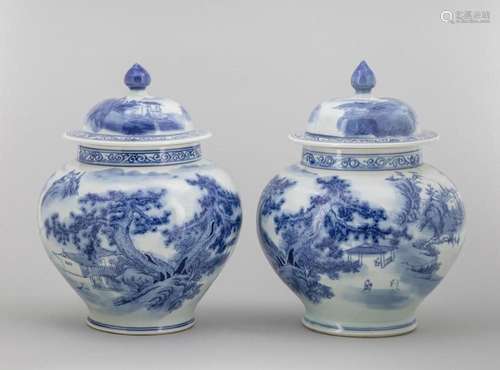 A pair of Chinese blue and white jars and covers decorated w...