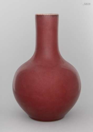 A Chinese flambe glazed long neck vase of globular form. 12 ...