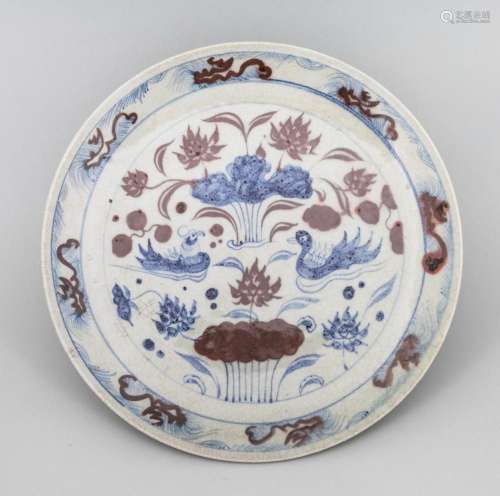 A Chinese blue and red \"Lotus Pond\" charger. 13 ...