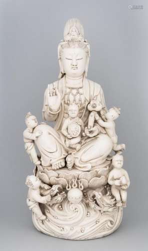 A Blanc de Chine seated figure of Guanyin, 20 1/2 x 9 1/2 x ...