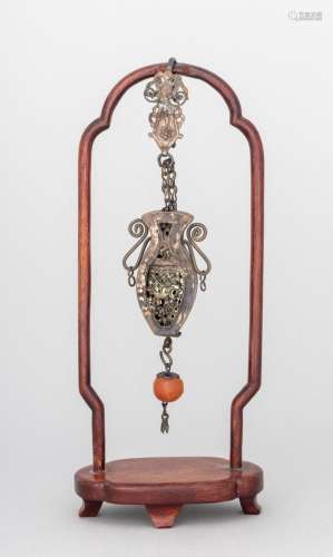 A Chinese white metal hanging pendant in the form of a vase....