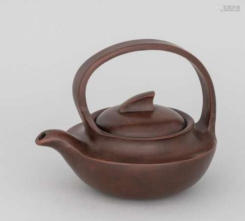 A Chinese purple clay handle teapot, 5 1/4 in. (13.3 cm.) d ...