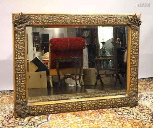 A large rectangular mirror, 39 x 52 in. (99.1 x 132.1 cm.)