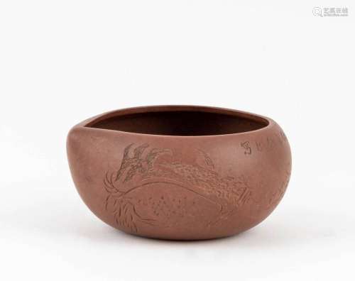 A Chinese Yixing pottery peach form bowl, 4 3/4 in. (12.07 c...