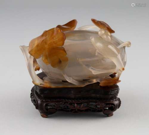 A Chinese agate water bowl of depressed globular form, 4 3/4...