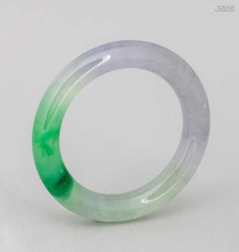 A Burmese lavender and green jadeite bangle. 2 1/4 in. (5.7 ...