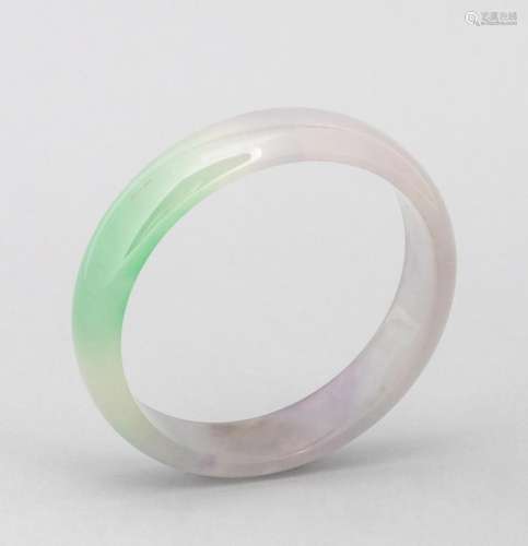 A lady\'s pale white icy jadeite bangle. 2 3/8 in. (6 cm.) i...