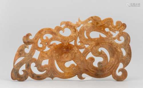 A large Chinese jadeite plaque in the form of a dragon and p...