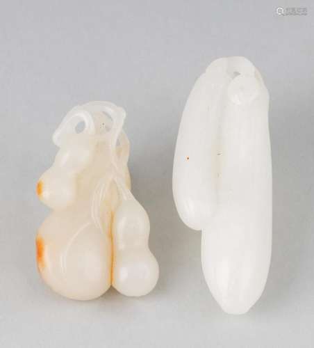 Two Chinese jadeite pendants, Largest: 3 in. (7.6 cm.) l.