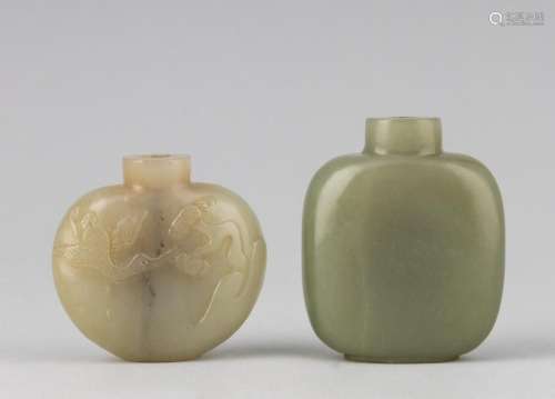 A Chinese celadon jadeite snuff bottle, 5 3/4 in. (14.6 cm.)...