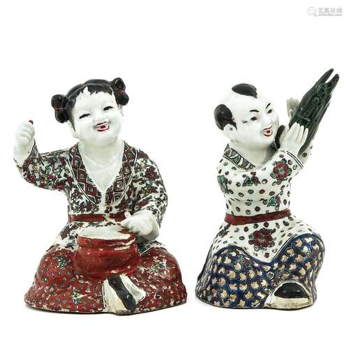 A Pair of Chinese Figures