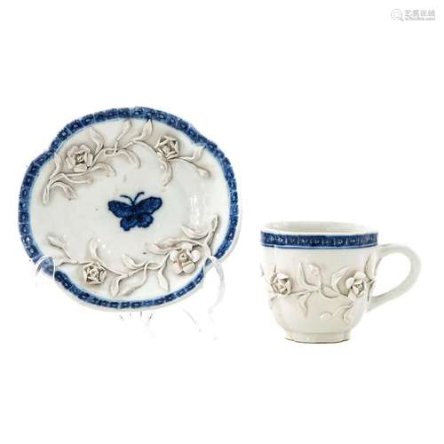 A Blue and White Cup and Saucer