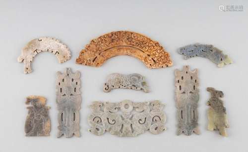 A collection of nine Chinese jadeite plaques in the archaic ...