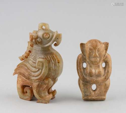 Two Chinese jadeite figures of mythical beasts. (2) 4 1/2 in...