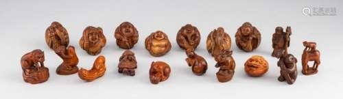 A collection of seventeen carved wood netsuke. 1 3/4 in. (4....