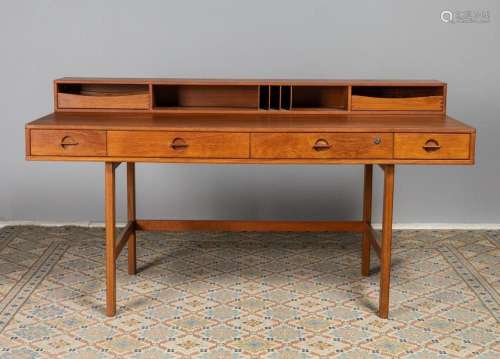 A teak mid-century modern Lovig Dansk flip top partners desk...