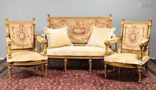 A Louis XVI style gilded canape together with a pair of matc...