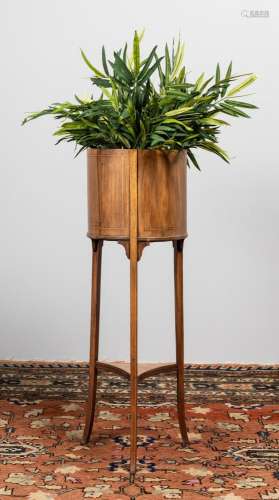 An Edwardian mahogany flower stand. 39 in. (99.1 cm.) h.