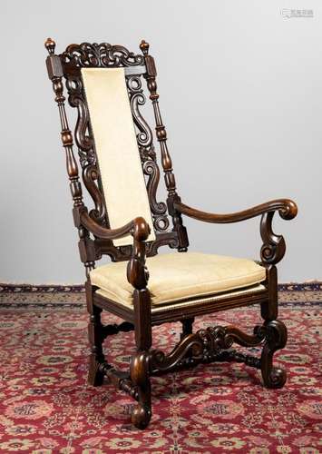 A 19th century Jacobean style open armchair