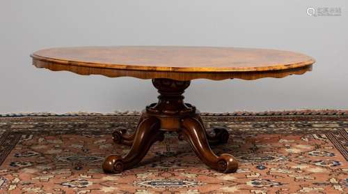 A walnut oval loo table, 21 1/2 x 44 x 57 in. (54.6 x 111.8 ...